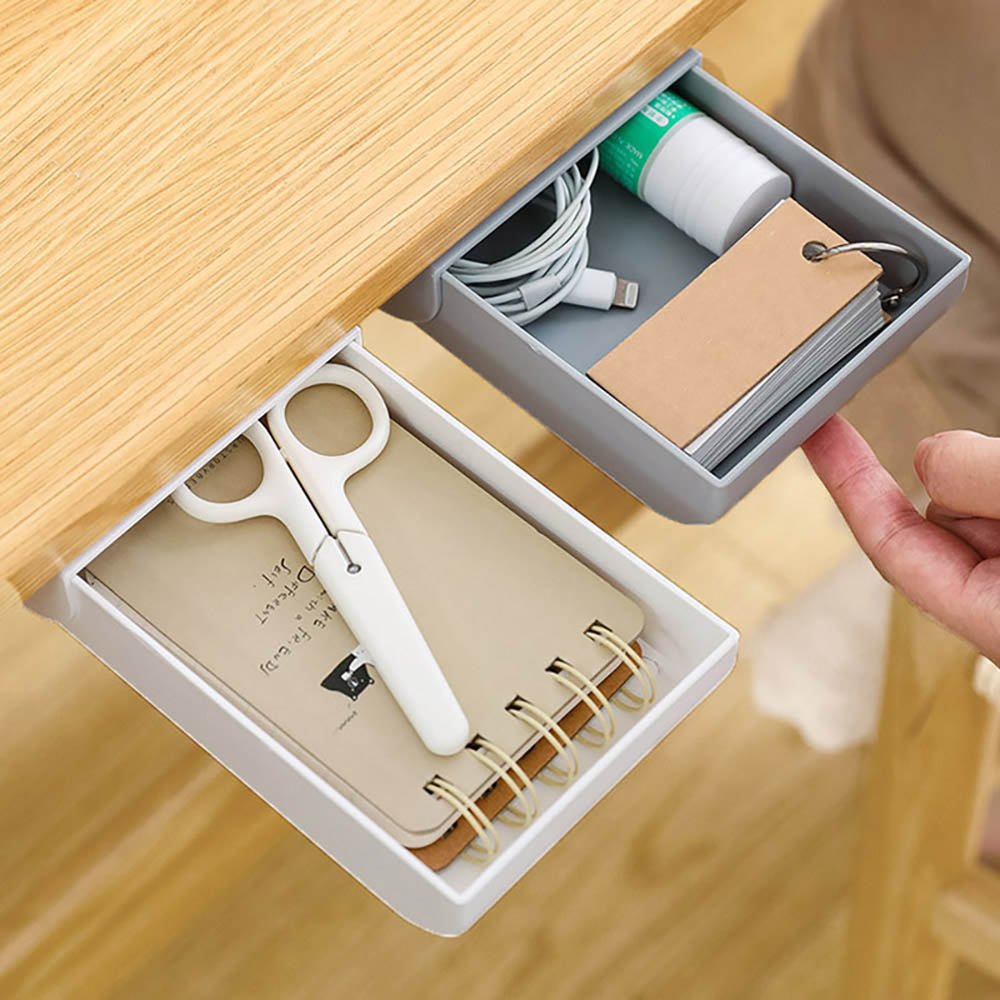 Tiroir auto-adhésif sous le bureau