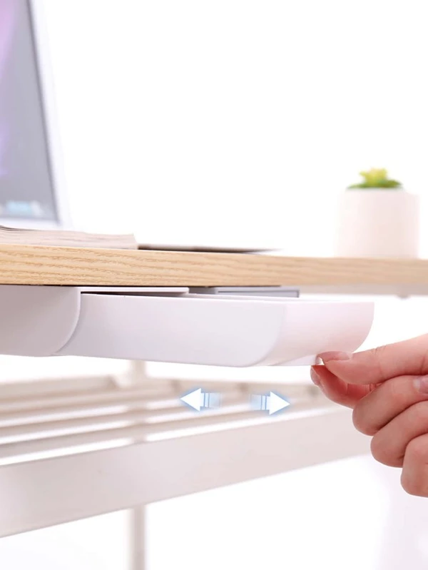 Tiroir auto-adhésif sous le bureau