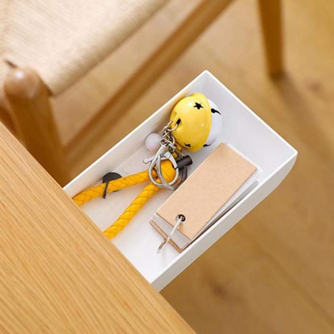 Tiroir auto-adhésif sous le bureau